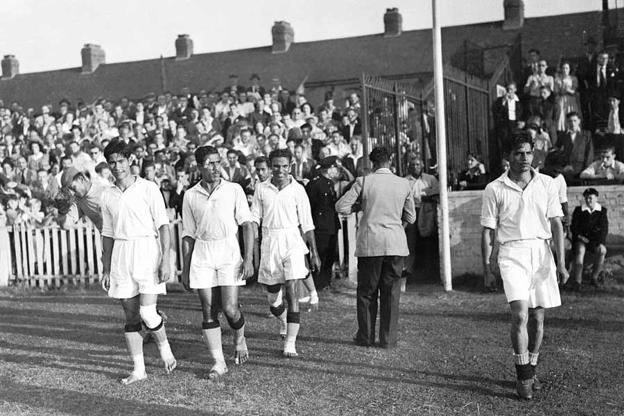 Talimeren Ao (first from left), an the Indian team walk out on London Ilford’s Cricklefield Stadium to play against France in the 1948 Olympics 