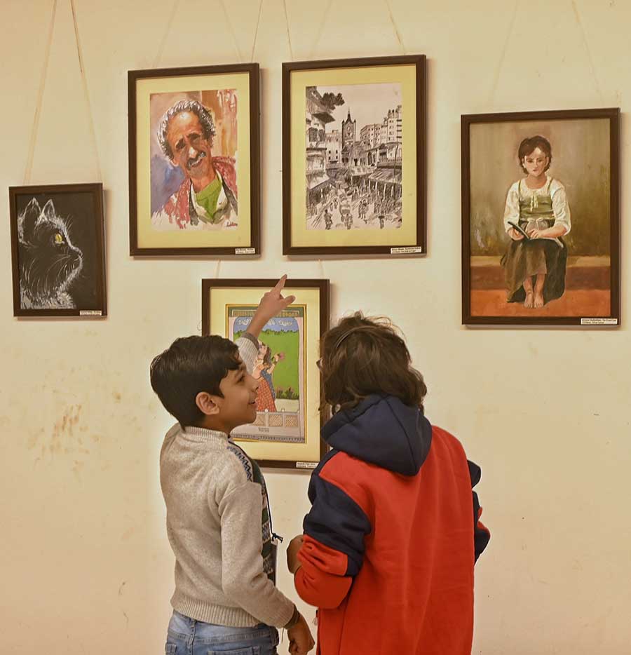 Visitors at an children’s art exhibition at Gaganendra Shilpa Pradarshashala on Saturday