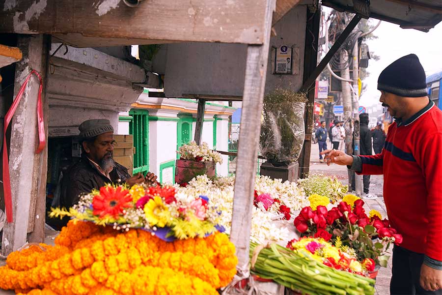 Flower shops run by Muslims sell flowers that are used by Hindus to pray