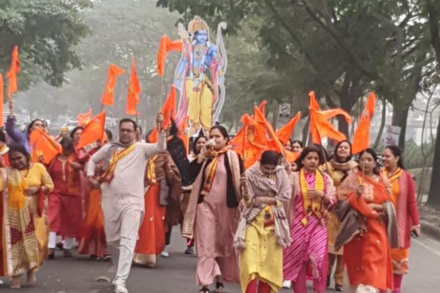 Residents of Urbana, off EM Bypass, during their 'prabhat pheri' on Monday.