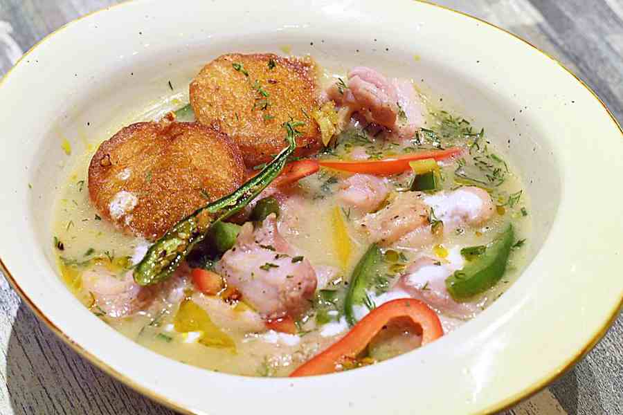 Butter Kacha Lonka Chicken Fricassee is a dish inspired by country chicken stew flavoured with green chilli, lime and cream