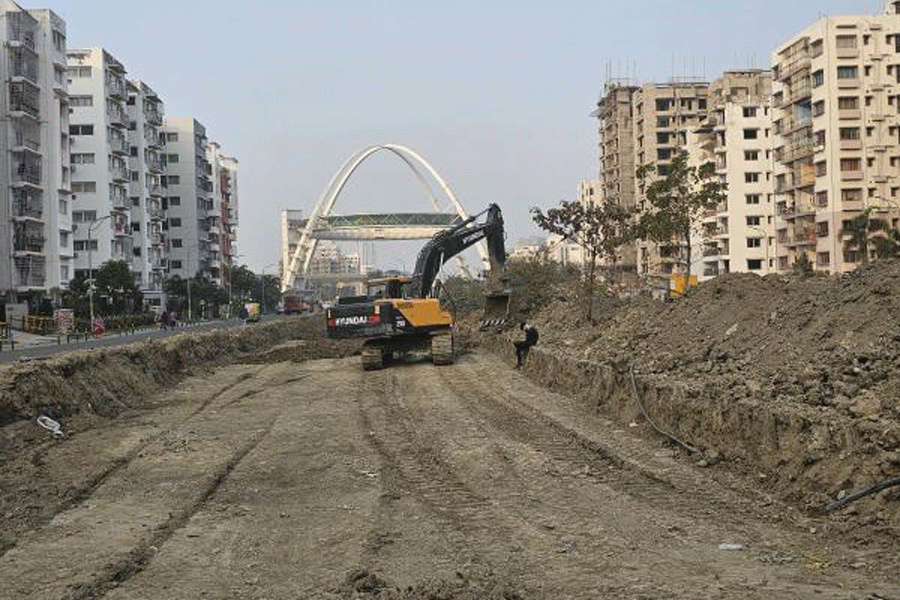 The divider being levelled at the Biswa Bangla Gate end of the road.