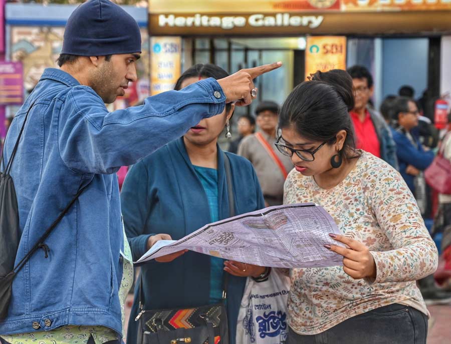 Visitors try to locate their favourite stalls at the 47th Kolkata International Book Fair on Saturday