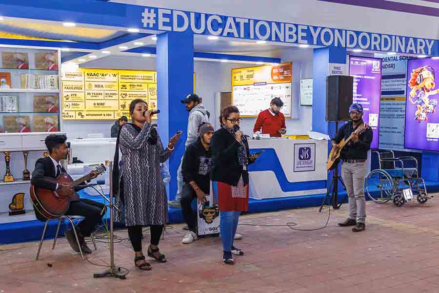 Right outside the stall of JIS Group, one can see youngsters picking up the microphone and playing the musical instruments to entertain visitors
