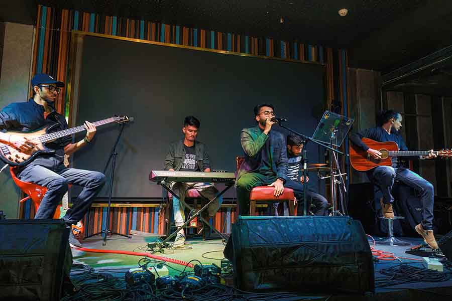 During the party, local bands and musicians kept spirits high with performances featuring songs by Rupam and other artistes. Akib Hayat (on mic) was the first act to take centre stage, followed by Tushar Debnath from Blood, Shibasish Banerjee, and Subhadeep Pan