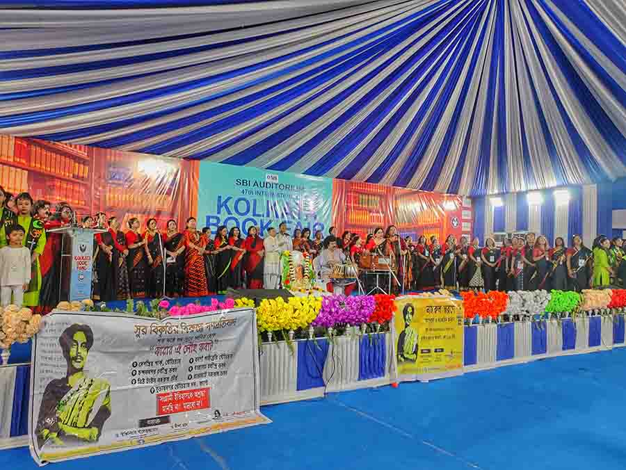 Singers perform at the SBI auditorium in the Kolkata Book Fair at the Salt Lake Central Park Boi Mela Prangan on Wednesday