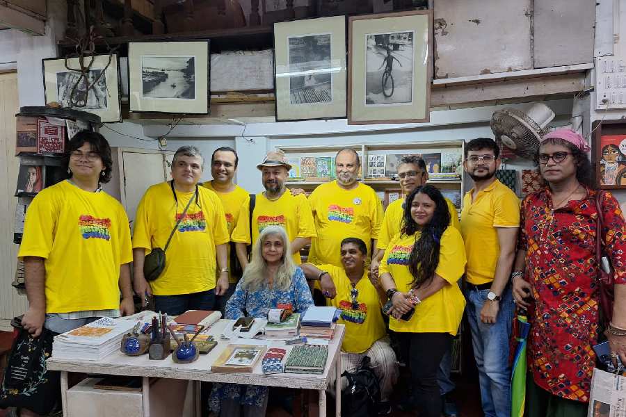 Friendship Walk ’99 25th Anniversary Events Team with the owner of the bookstore