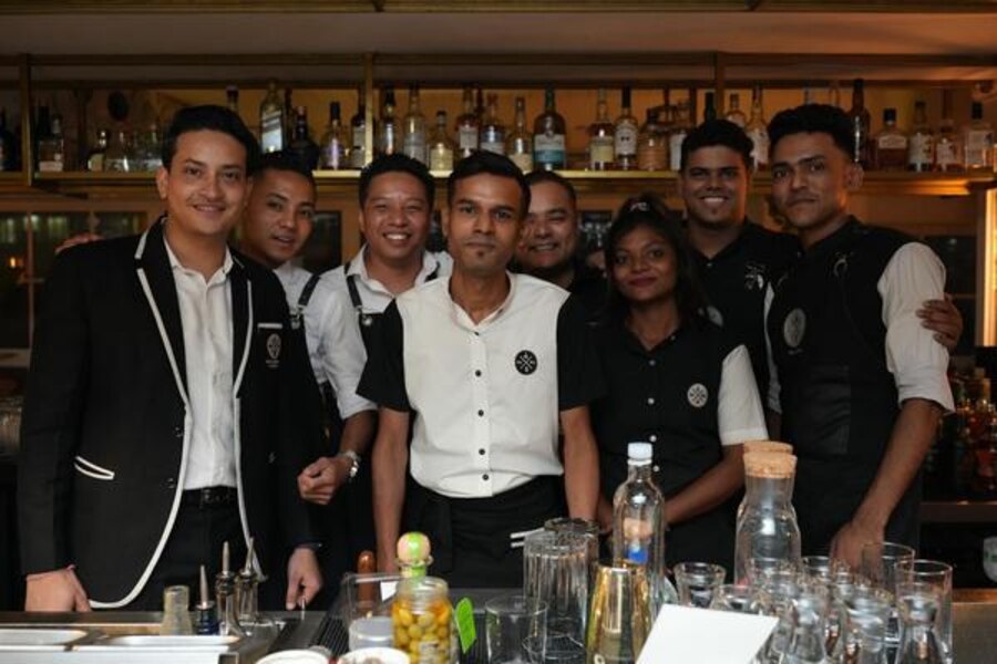 The AMPM mixologist team and the Bitter & Co. team huddled up for a picture