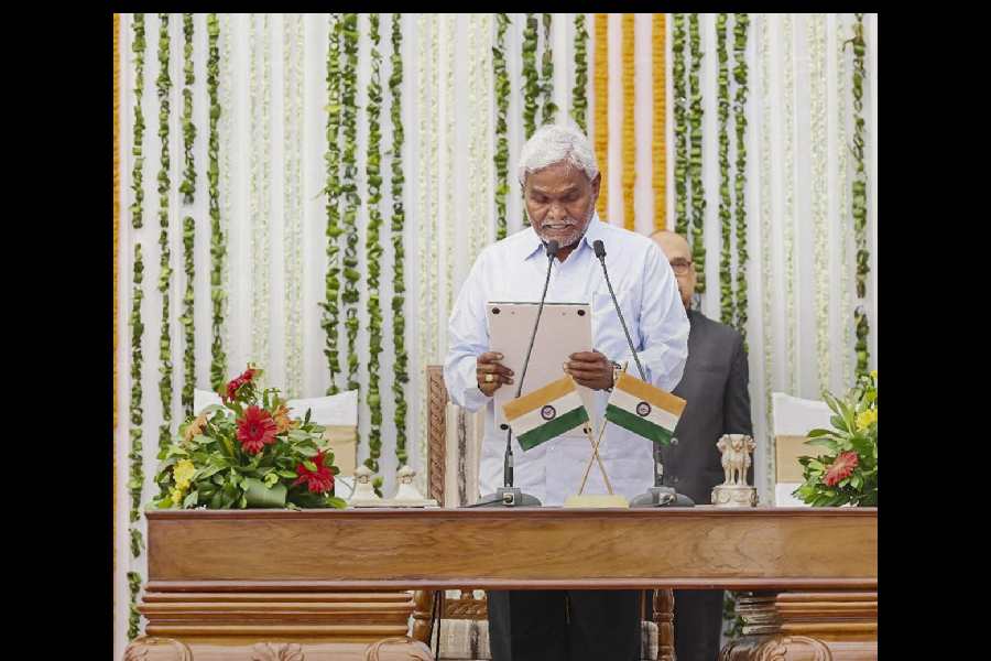 Jharkhand Mukti Morcha (JMM) MLA Champai Soren takes oath as a minister in the newly formed Hemant Soren government, administered by Jharkhand Governor C. P. Radhakrishnan, at Raj Bhavan, in Ranchi