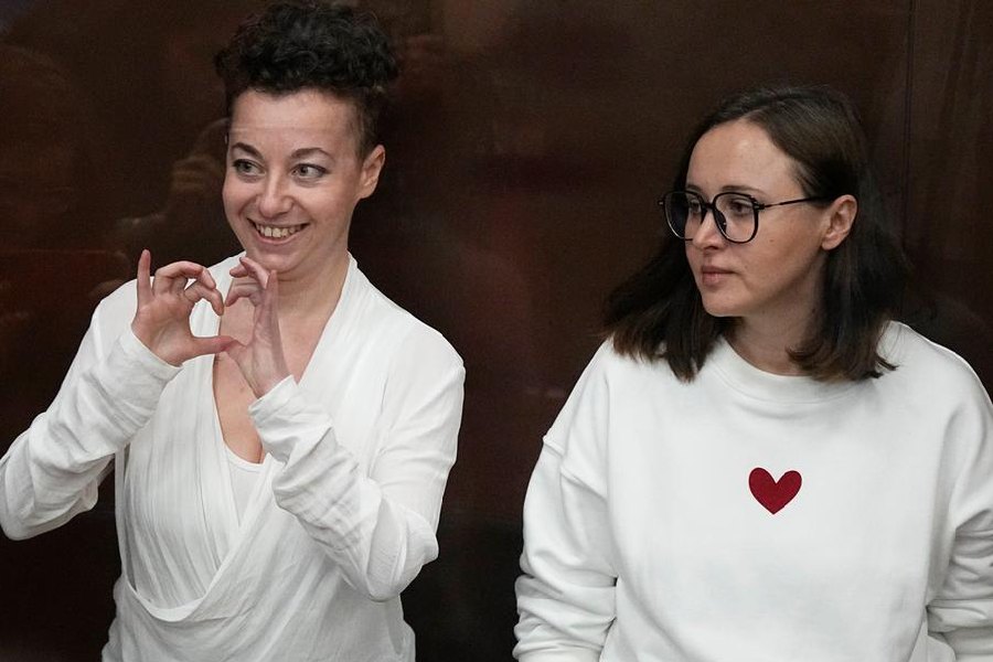 Berkovich made the heart-shaped hand signal commonly used by opposition groups in Russia from behind the security glass during the hearings prior to Monday's verdict