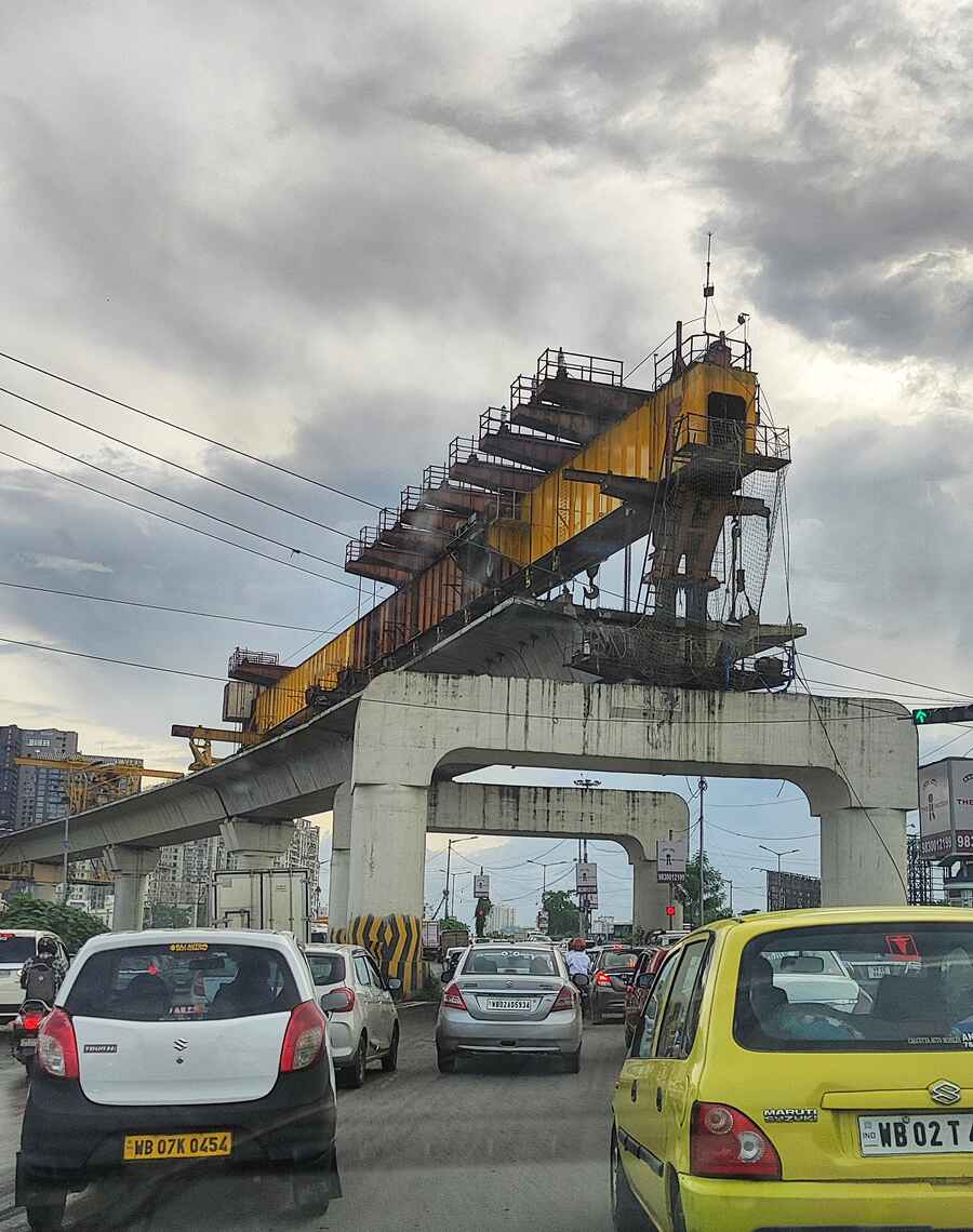 Work on the pier construction work of the Orange Line of Kolkata Metro is progressing swiftly at the Chingrighata crossing on EM Bypass