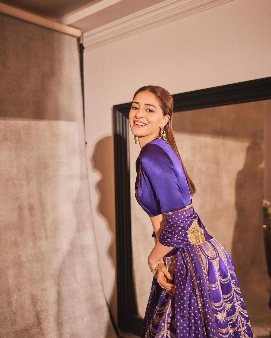 Ananya was all smiles during a photoshoot at the mehendi ceremony. The actress, who will be seen in a cameo role in Vicky Kaushal-Triptii Dimri’s Bad Newz, wore her hair down and looked radiant in dewy makeup.