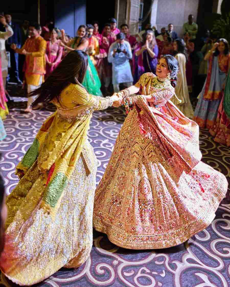Radhika enjoyed dancing with her friend at one of the ceremonies.