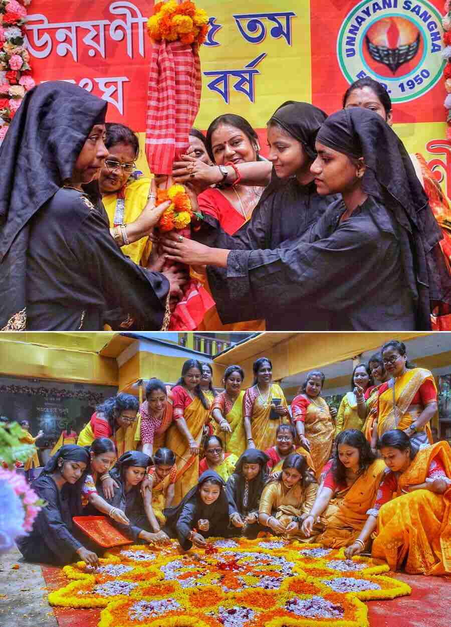 Muslim women take part in ‘khunti puja’ and creating ‘alpona’ at Unnayani Sangha Club in Kudghat on Saturday