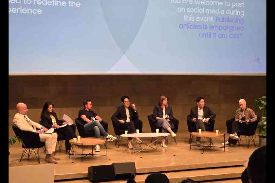 (Left to right) Chris Brauer, Lucia Russo, Don McGuire, Won-joon Choi, Jenny Blackburn, Daehyun Kim, Carolina Milanesi at a discussion on how mobile AI is poised to redefine the user experience, organised by Samsung, in Paris on July 11