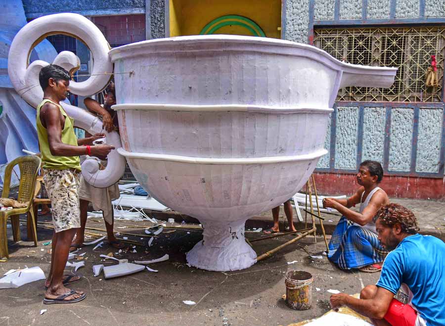 Artisans put finishing touches to a ‘taazia’ at Dompara on Monday for Muharram. The solemn occasion falls on July 17 this year