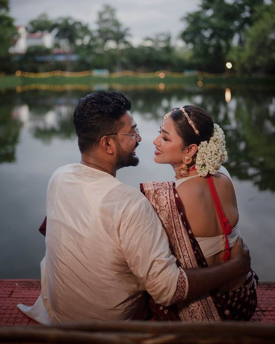 Friends and families of the newlyweds attended the wedding, which took place in the serene setting of a lake.
