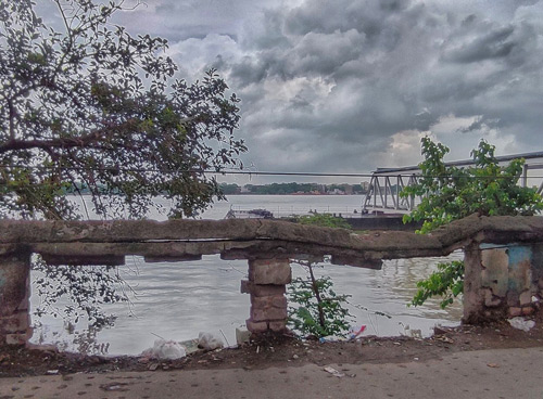 A part of the wall next to Sovabazar ferry is damaged and falling apart from lack of maintenance  