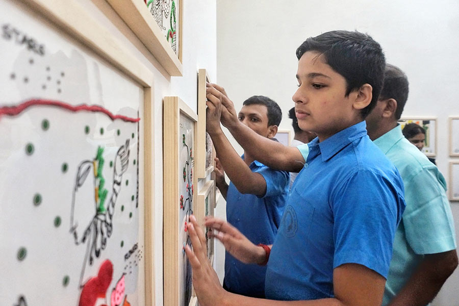 Students feel the artworks on display at the Kolkata Centre for Creativity
