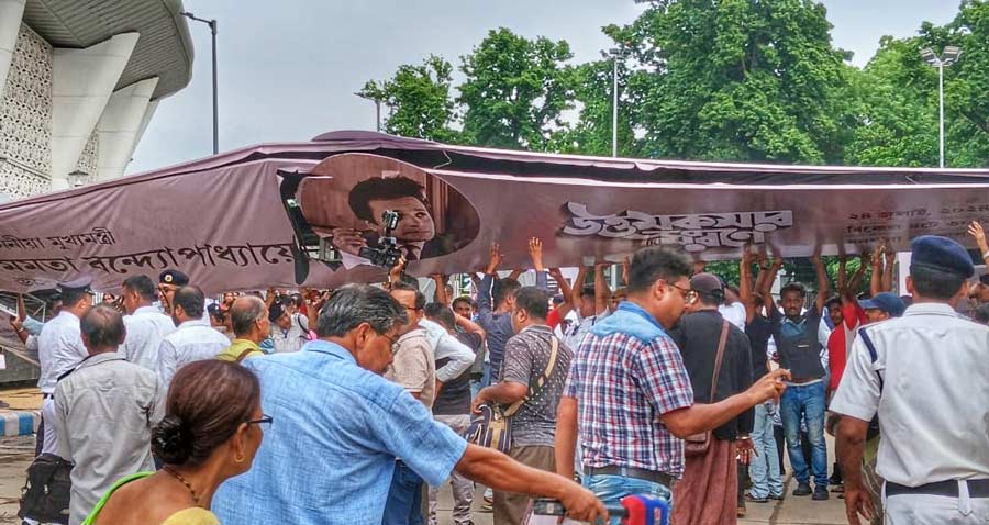 Two persons were injured after a bamboo gateway installed at the entrance of Dhana Dhanya auditorium in Alipore during a state programme organised on the death anniversary of Uttam Kumar collapsed on Wednesday