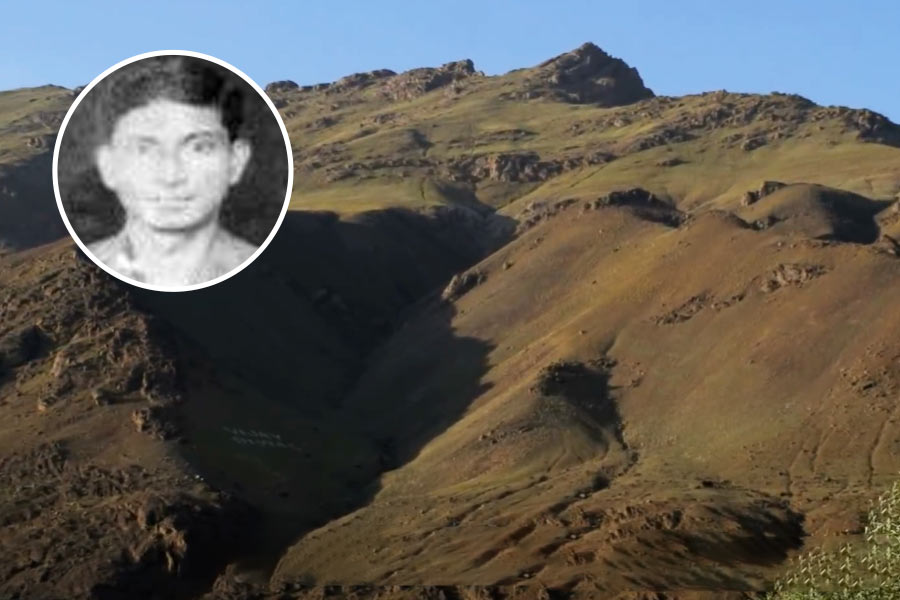 Tololing; (inset) Major Rajesh Adhikari