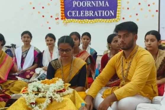 The celebration commenced with the esteemed 'Paduka Puja' of the revered Guru, fondly known as Amma.