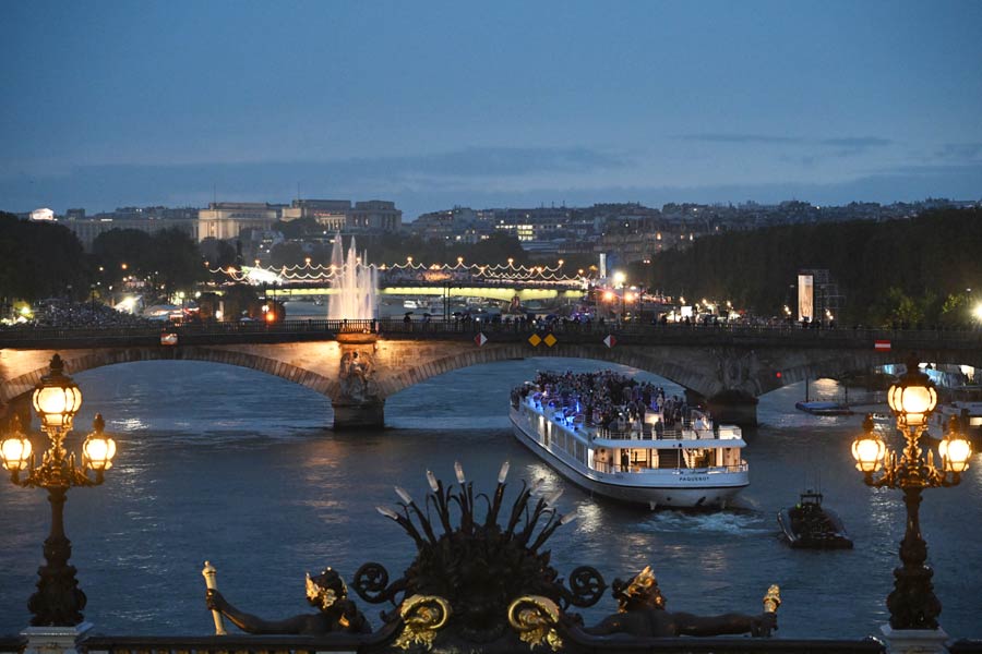The boat carrying team France during the opening ceremony of the 2024 Paris Summer Olympics along the Seine in Paris, on Friday, July 26, 2024. 