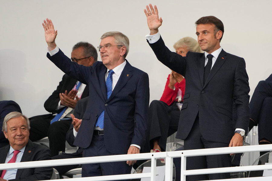 President Emmanuel Macron, right, of France and Thomas Bach, president of the International Olympic Committee, attend the opening ceremony of the 2024 Paris Summer Olympics in Paris, on Friday, July 26, 2024. 
