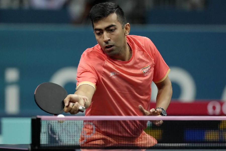 India's Harmeet Desai during his 4-0 win over Jordan's Zaid Abu Yaman during their round table tennis match.