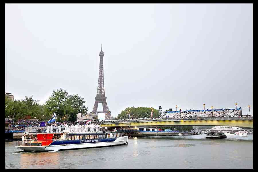 A general view of the the opening ceremony as members of Team El Salvador make their way on a boat on River Seine on Friday. Picture: Reuters