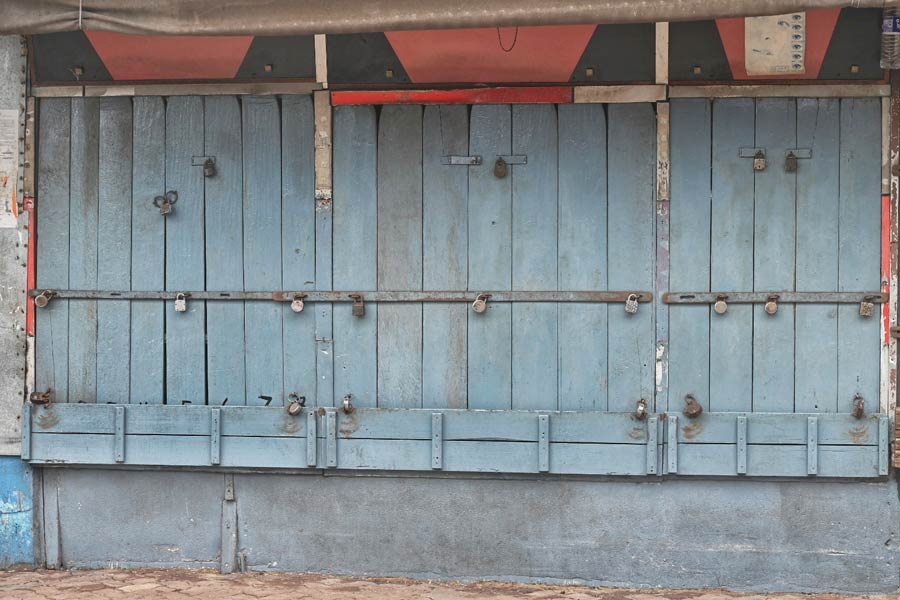 Not a soul could be seen around the locked book shops on College Street