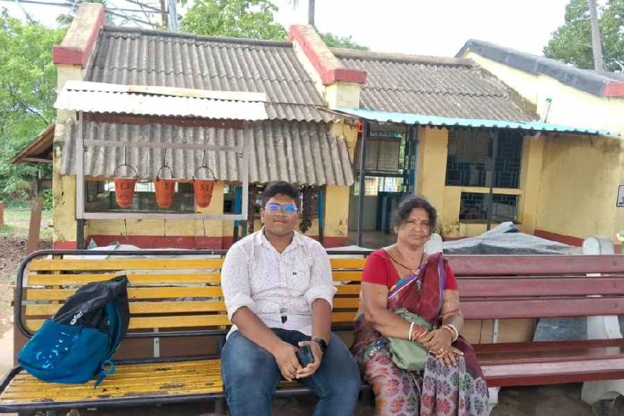 Mandakini Panda with her 15-year-old son at Bahanaga station