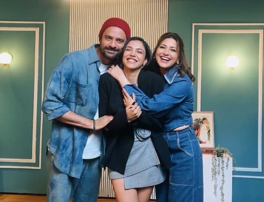 While Jaideep and Sonali twinned in denim outfits, Shriya put an open-front black shrug over a sky-blue mini dress featuring a rose pleat at the hem. 