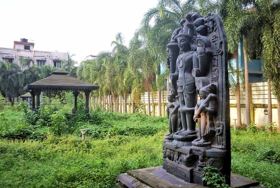 The black beauty of a sculpture (in picture). Inside, the next exhibit hall probably provides the best viewing experience. Walking into the room one sees a large-scale replica of a Buddhist monastery in Nandadirghi. Showing how the monastery was planned out, the display will make you wonder how something so sophisticated and so well planned was made several centuries ago. The walls of this particular exhibit display the different panels of what would have been present on the walls of the Buddhist monastery. Various  animal terracotta plaques and even zodiac signs are on display along with monoliths and tools from the era. A large-scale model of archaeological sites and remains at Jagjivanpur in Malda is also present in this exhibit. Both large-scale models are 30x30 feet and town planning from centuries gone by