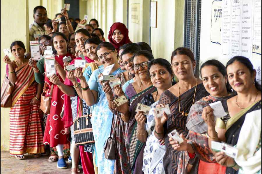 Chikkamagaluru: People wait in a queue to cast their votes at a polling booth during the Karnataka Legislative Council elections, in Chikkamagaluru, Monday, June 3, 2024
