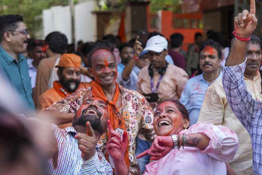 Shiv Sena (UBT) supporters celebrate the party's lead during counting of votes for Lok Sabha elections, at the Shiv Sena Bhavan, in Mumbai