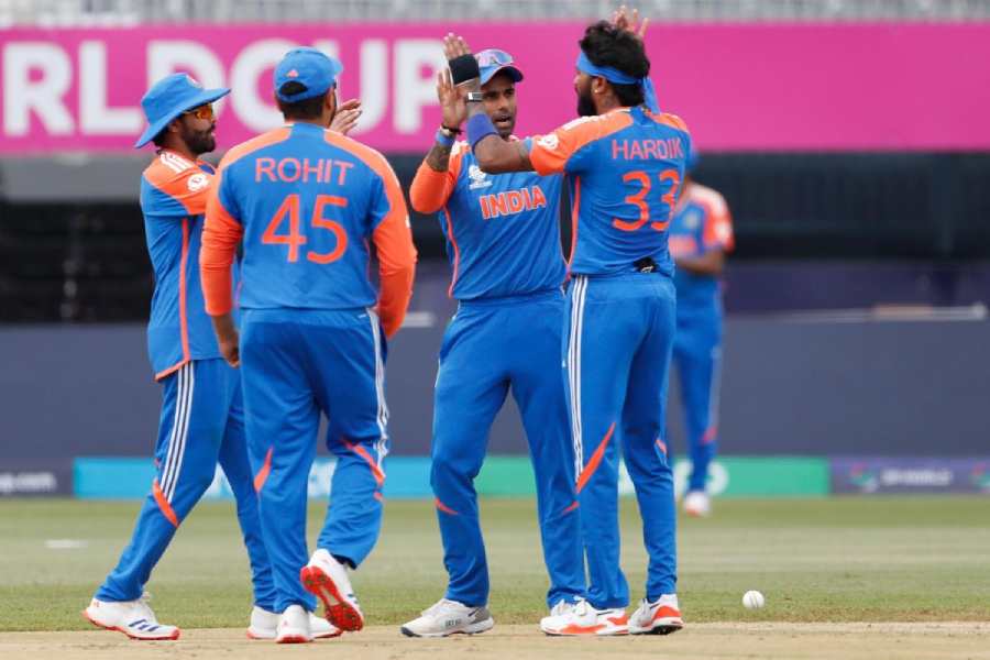 Hardik Pandya (from behind), in a picture shared on X, celebrates with teammates after one of his three wickets on Wednesday.