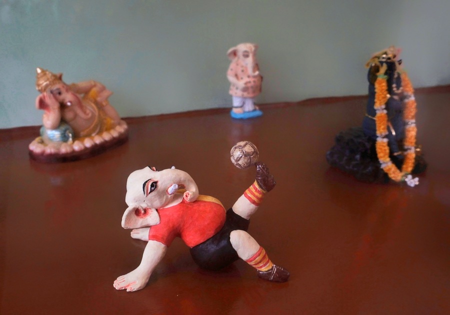 While Lord Ganesh is worshipped as the remover of obstacles and the god of wisdom and prosperity, mythological stories also depict Ganesh as having a playful character. That, along with the elephant-human form of the god, mean that the mythological figure has been translated into fun statues and dolls. The Ganesh collection at the museum houses many such examples, from traditional forms to fun ones like this one of Ganesh playing football