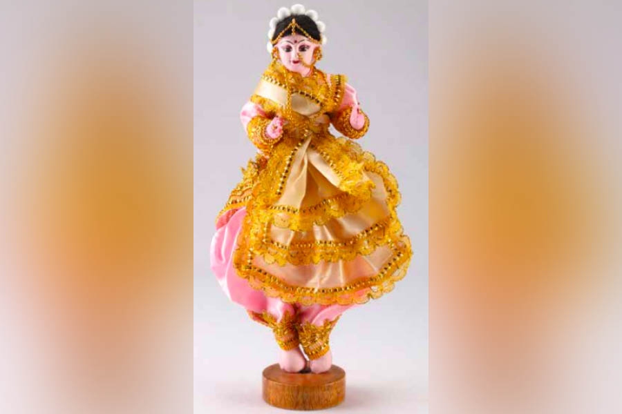 A dancer made up of rags.