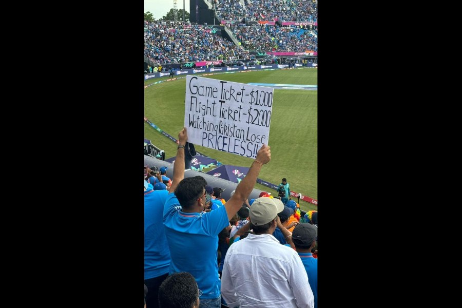A Team India supporter in the stands holds up a cheeky poster during the match against Pakistan at the Nassau County International Stadium in New York on Sunday, in a picture shared on X