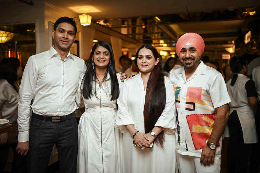 L-R: AMPM brand partners Dheeraj Maniyar and Namrata Maniyar and brand owners Deepika and Rajan Sethi pose for the camera. ‘AMPM has established itself as Kolkata’s premium spot for cocktails, coffee, and live music. We plan to bring in more renowned artists from India and beyond, and host international bar takeovers, including from the World’s 50 Best Bars,’ said Dheeraj