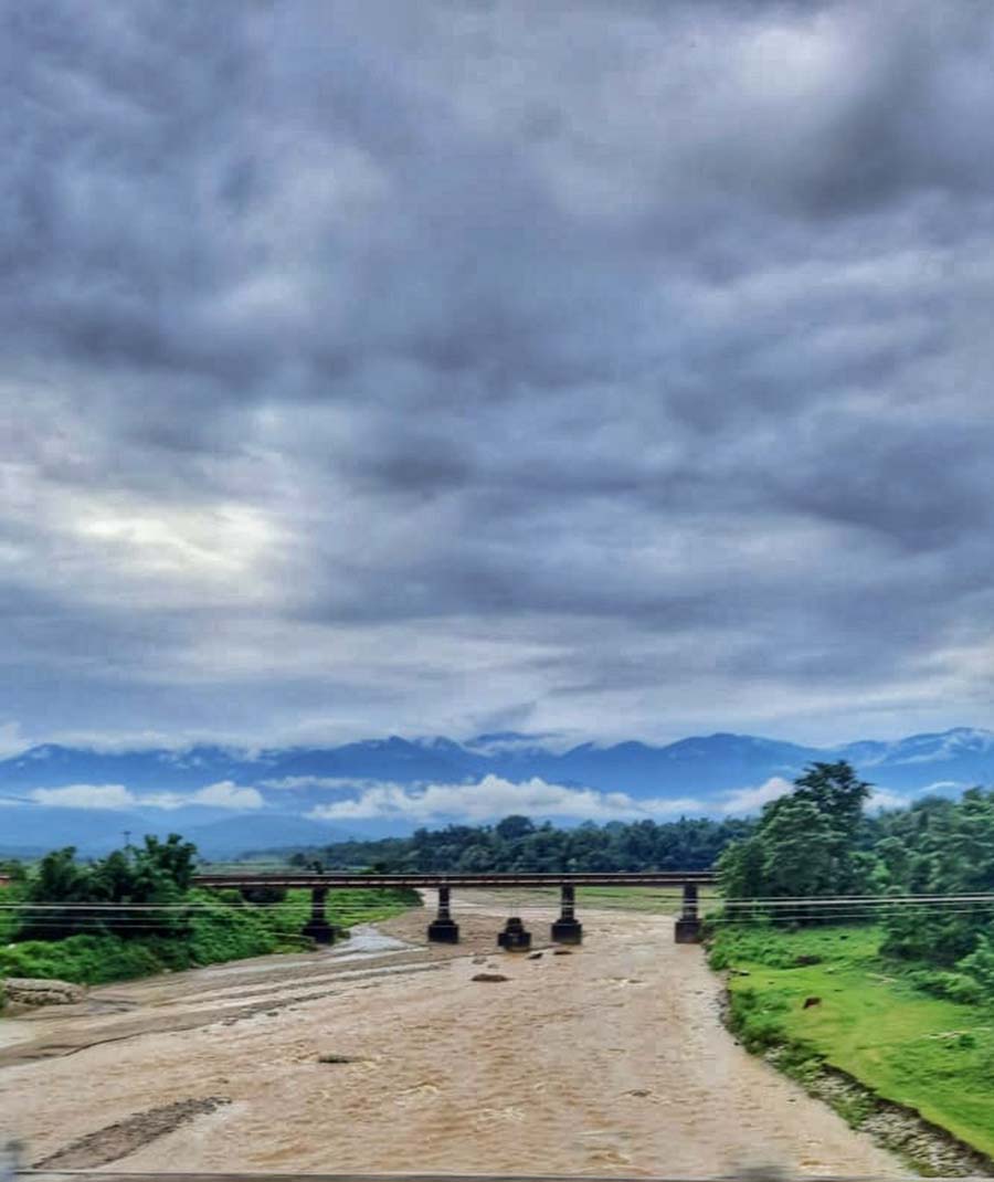 A swollen Mal river in north Bengal’s Jalpaiguri district. Though the monsoon trough is causing heavy rain in Sikkim and northern part of the state, it is yet to reach Kolkata and south Bengal