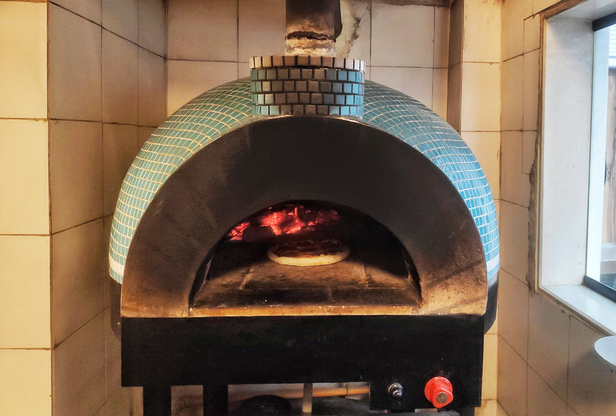 From the dough to the pizza sauce, Pico makes it all in-house while the woodfire oven adds a smoky flavour to the pizzas and baked items. ‘Our oven bakes at a temperature of 550°C so we have to make our bread fresh since it doesn’t take us long to bake it,’ explained Prateeek Didwania, the owner of Pico, his second F&B venture after Snacking opposite South City Mall 