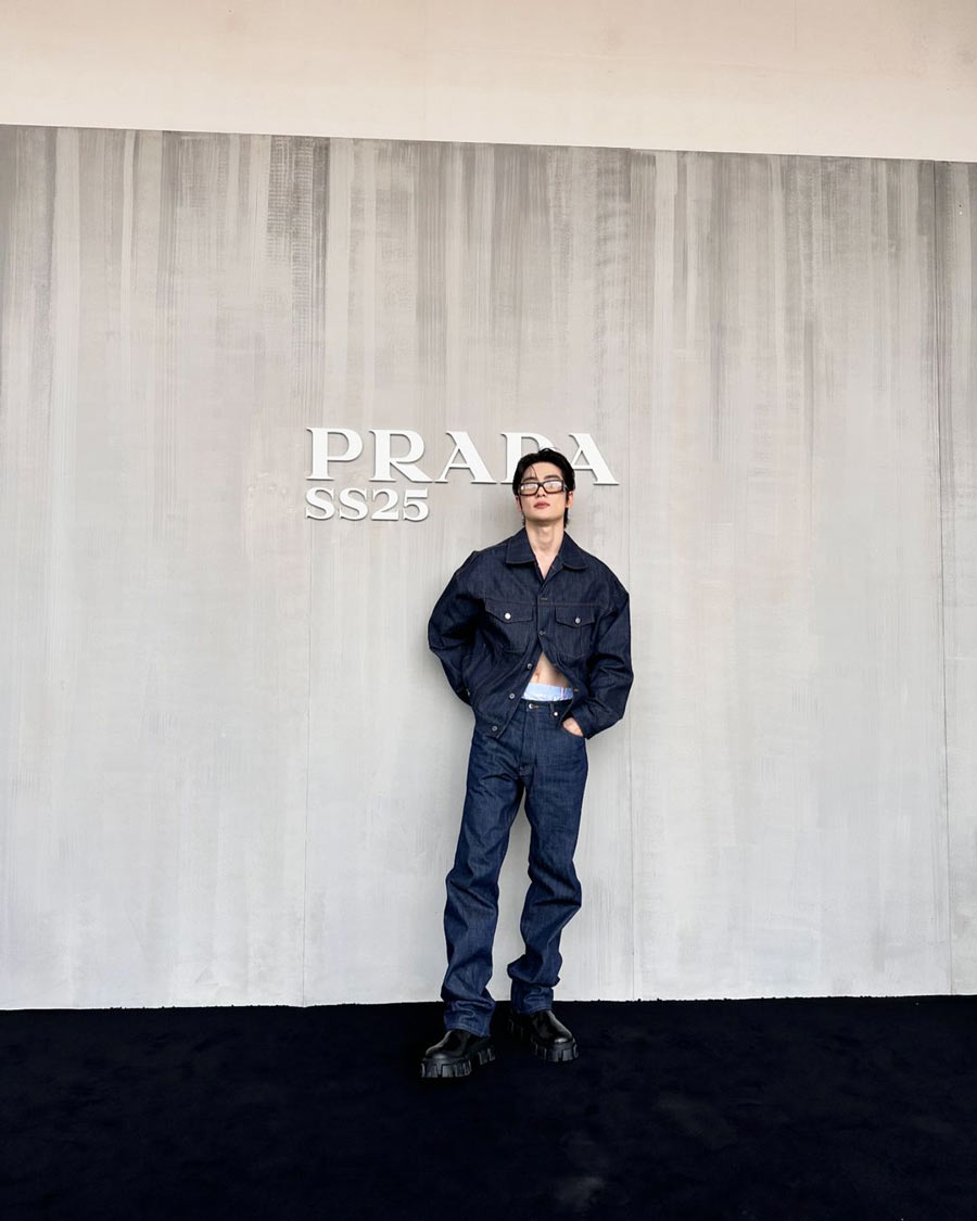 Jaehyun, member of the boy band NCT, grabbed eyeballs in a denim-on-denim outfit to represent the Prada collection. The Try Again singer wore a denim drop-shoulder jacket without a shirt and paired it with low-waist denim pants. Chunky black boots and stylish glasses accessorised his look.
