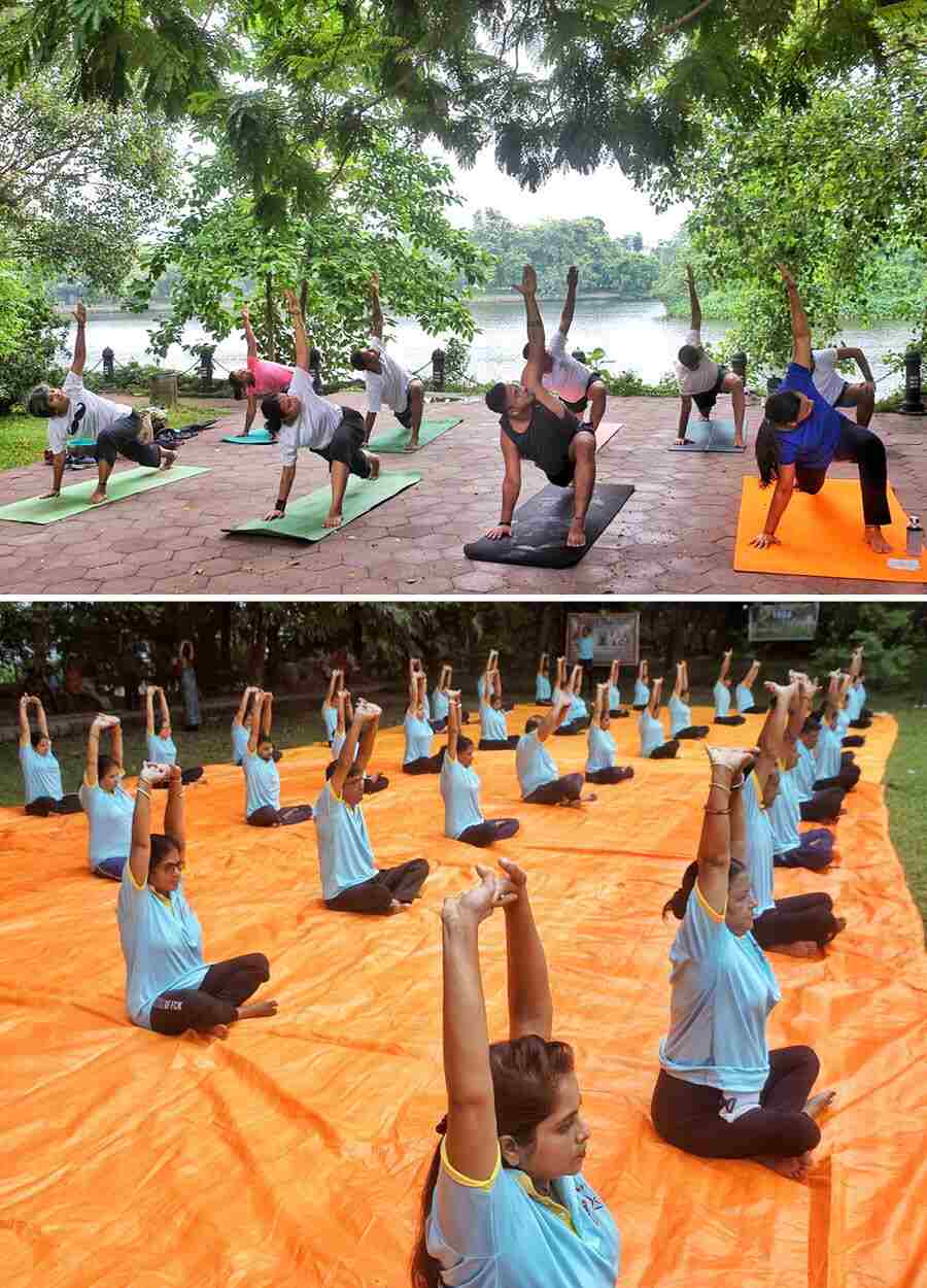 Members of Sarobar Yoga Friends perform yoga at Rabindra Sarobar near Menoka cinema on Friday