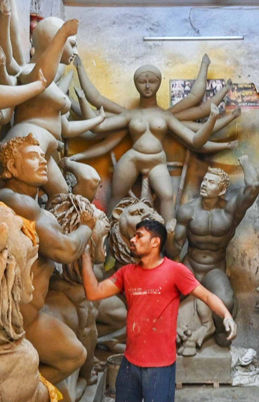 With 107 days left for Durga Puja, artisans at Kumartuli are working to complete the idols on time. This year Sashthi falls on October 9  