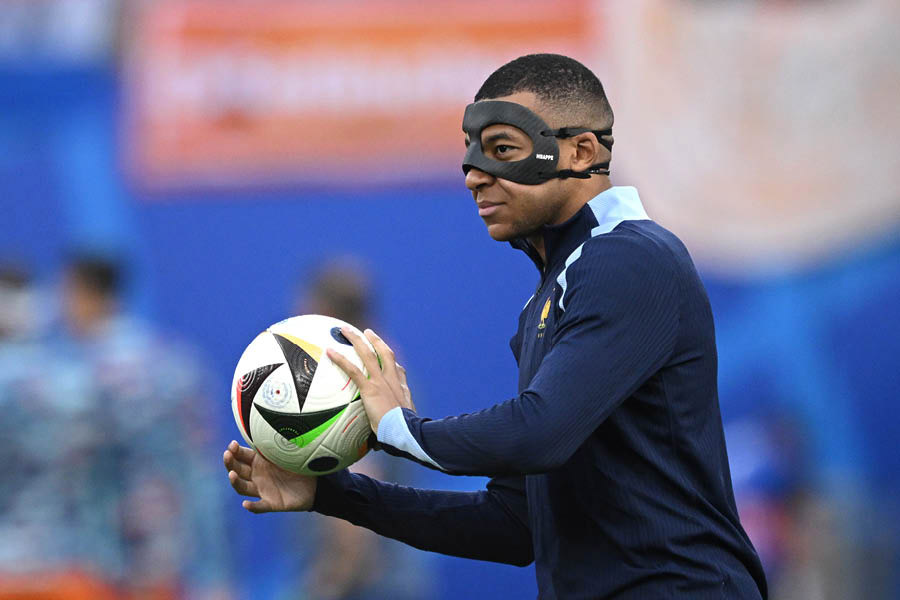Kylian Mbappe, all masked up, should be ready to help France in the knockouts of Euro 2024