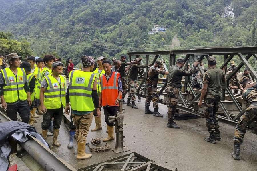 Army Engineers and BRO personnel of Project Swastik launch a Bailey Bridge on Dikchu-Sanklang road to restore connectivity to North Sikkim and Dzongu region