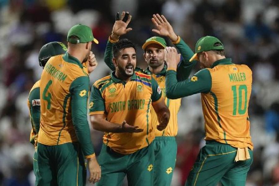 South Africa spinner Tabraiz Shamsi (centre) celebrates one of his three wickets in Tarouba on Wednesday