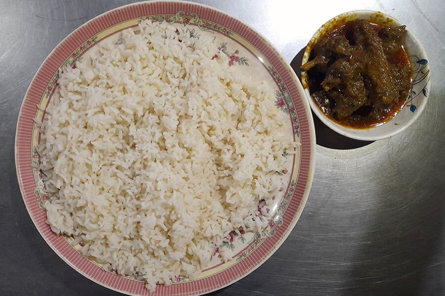 Rice and duck bhuna at Bismillah Hotel and Restaurant.
